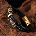 Pulseira de Couro Trançado Preto com Charme Dourado